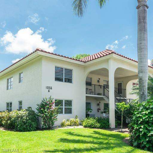 1056 FOREST LAKES DR # A-101, NAPLES, FL 34105, photo 1 of 20
