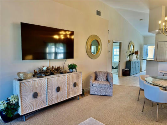 437 WIGGINS LAKE CT APT 201, NAPLES, FL 34110, photo 2 of 34