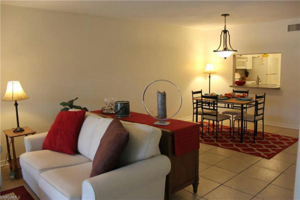 5535 RATTLESNAKE HAMMOCK RD APT 103, NAPLES, FL 34113, photo 4 of 28