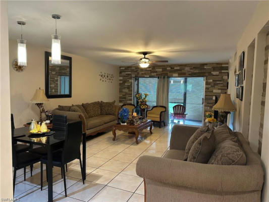 5697 RATTLESNAKE HAMMOCK RD APT 105C, NAPLES, FL 34113 - Image 1