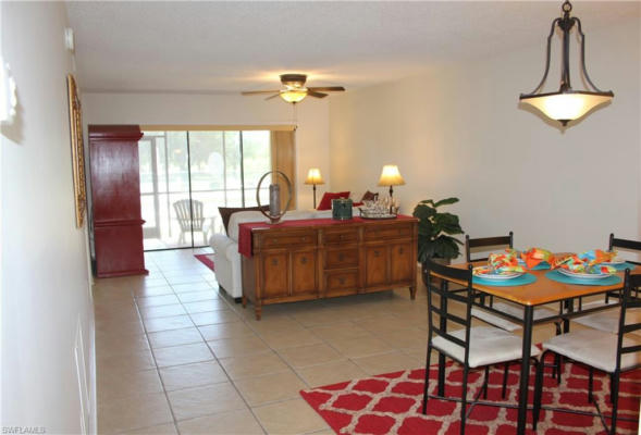 5535 RATTLESNAKE HAMMOCK RD APT 103, NAPLES, FL 34113, photo 2 of 28